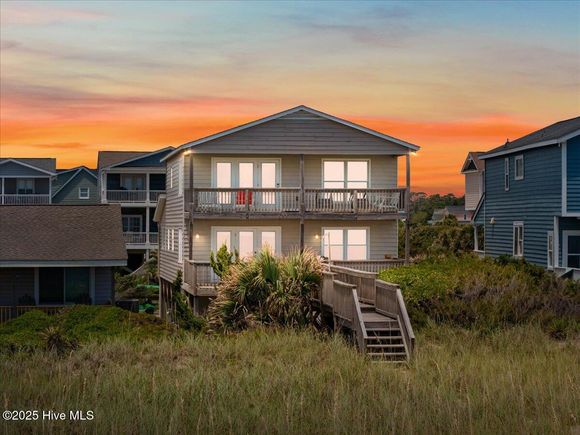 877 Ocean Boulevard Holden Beach, NC House Active - Photo 1 of 64. Opens carousel modal