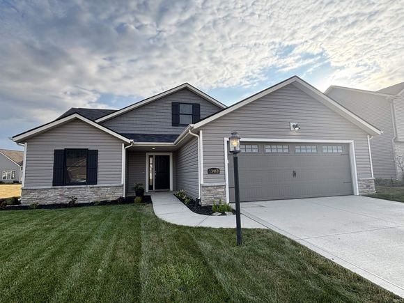 13469 SADDLE CREEK Grabill, IN House Active - Photo 1 of 25. Opens carousel modal