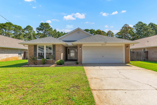 8574 Wilburn Cove Navarre, FL House Active - Photo 1 of 28. Opens carousel modal