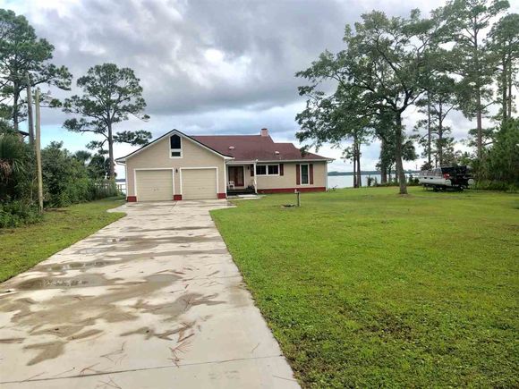 2467 Surf Road Ochlockonee Bay, FL House Sold - Photo 1 of 21. Opens carousel modal