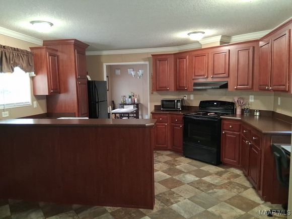 1138 Flat Rock Road Tallassee, AL House Active - Photo 1 of 16. Opens carousel modal