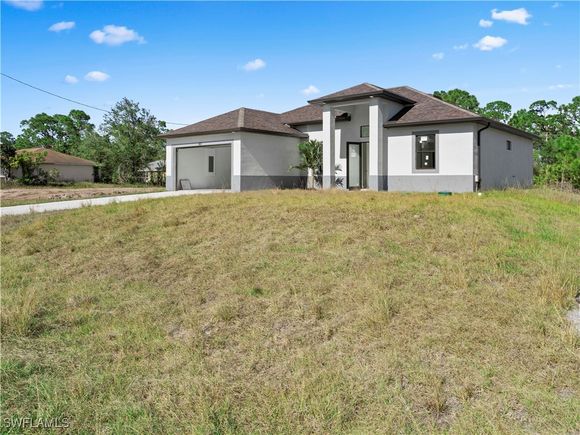 923 Winters Street E Lehigh Acres, FL House Pending - Photo 1 of 39. Opens carousel modal