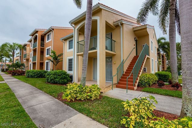 1195 Wildwood Lakes Boulevard Unit 107 Naples, FL Condo Active - Photo 1 of 27. Opens carousel modal