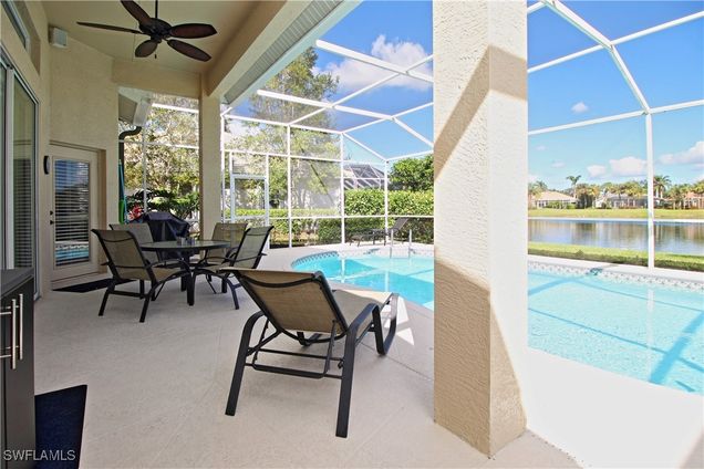 1842 Winding Oaks Way Naples, FL House Active - Photo 1 of 32. Opens carousel modal