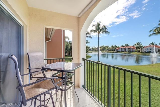 1265 Wildwood Lakes Boulevard Unit 208 Naples, FL Condo Active - Photo 1 of 23. Opens carousel modal