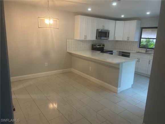 18001 San Juan Court Unit 4 Fort Myers, FL House Active - Photo 1 of 9. Opens carousel modal