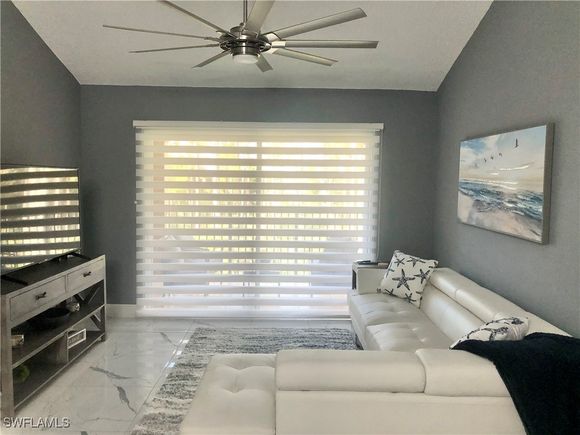 1220 Wildwood Lakes Boulevard Unit 306 Naples, FL Condo Active - Photo 1 of 27. Opens carousel modal