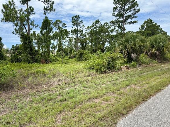 1244 Cordoba Street E Lehigh Acres, FL Plot of land Active - Photo 1 of 4. Opens carousel modal