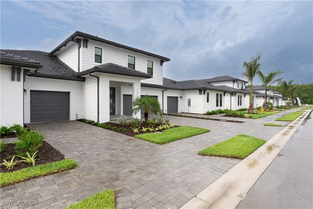 10917 Preachers Cove Lane Fort Myers, FL Townhouse Active - Photo 1 of 32. Opens carousel modal