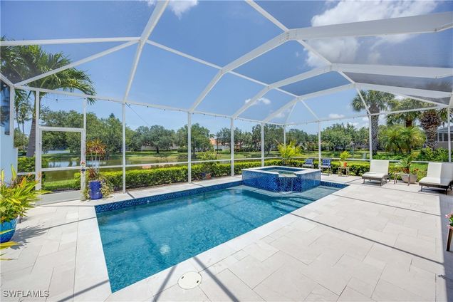 3997 Isla Ciudad Court Naples, FL House Active - Photo 1 of 50. Opens carousel modal