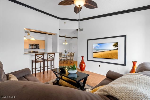 1235 Reserve Way Unit 5 Naples, FL Condo Active - Photo 1 of 27. Opens carousel modal