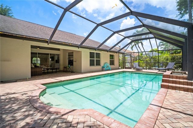 2124 Piccadilly Circus Naples, FL House Active - Photo 1 of 28. Opens carousel modal