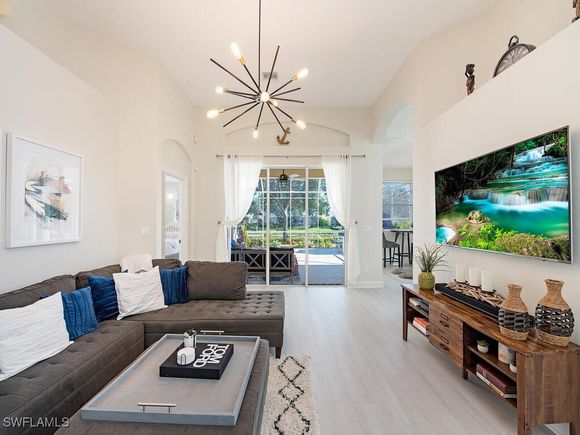 8098 Tauren Court Naples, FL House Active - Photo 1 of 17. Opens carousel modal