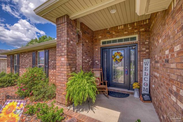 6065 Autumn Pines Cir Pace, FL House Active - Photo 1 of 56. Opens carousel modal