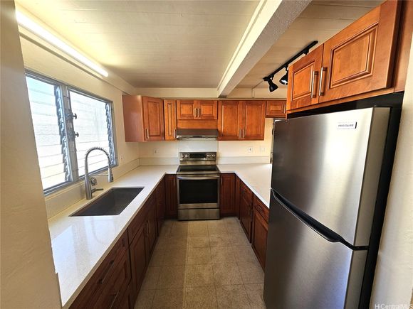 Tropicana Manor Moanalua - 827 Ala Lilikoi Street Unit 6 Honolulu, HI Townhouse Active - Photo 1 of 16. Opens carousel modal