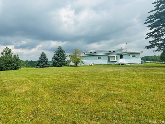 2365 E Haskell Lake Road Harrison, MI House Active - Photo 1 of 21. Opens carousel modal