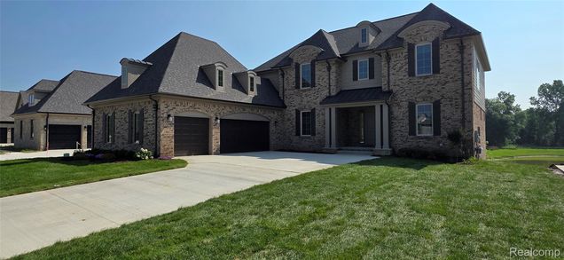 55590 Laurel Oaks Lane Macomb, MI House Active - Photo 1 of 41. Opens carousel modal