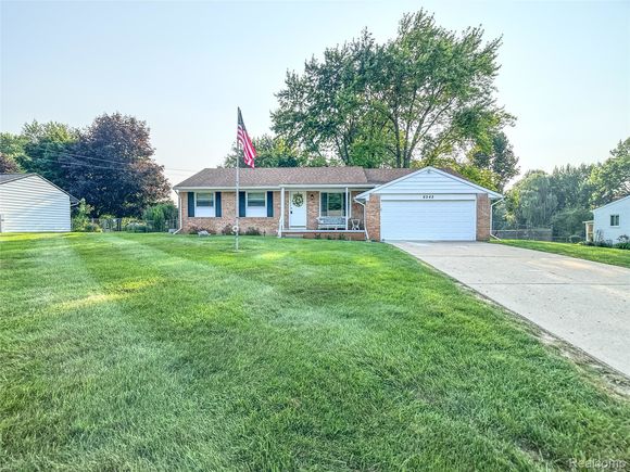 6042 Wild Turkey Road GrandBlanc, MI House Active - Photo 1 of 59. Opens carousel modal