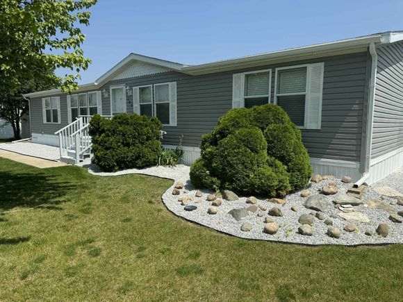 7204 E Grand River Ave Unit Lot 142 Portland, MI House Active - Photo 1 of 30. Opens carousel modal