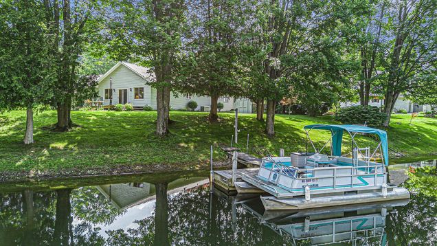 6860 E Harbor Drive ElkRapids, MI House Active - Photo 1 of 29. Opens carousel modal