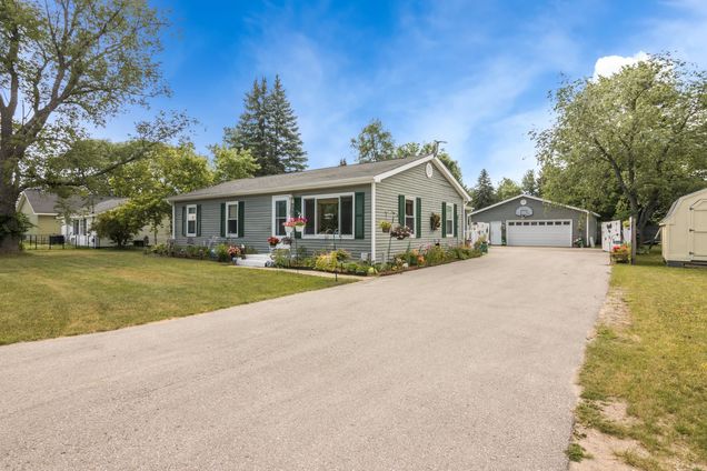 211 Division Street Kalkaska, MI House Active - Photo 1 of 36. Opens carousel modal
