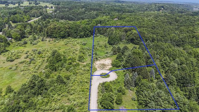 1.6 Acres January Drive TraverseCity, MI Plot of land Active - Photo 1 of 16. Opens carousel modal