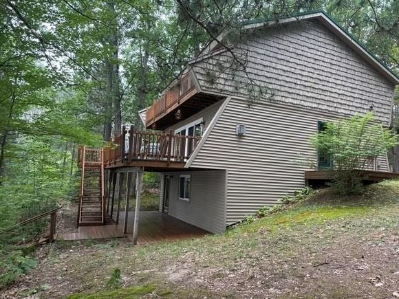 9278 NE Pine Drive Mancelona, MI House Active - Photo 1 of 36. Opens carousel modal