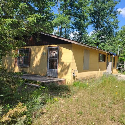 6704 S Sincerity Idlewild, MI House Active - Photo 1 of 7. Opens carousel modal