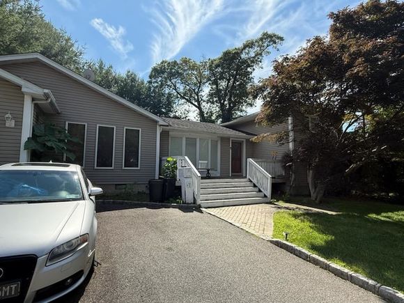 57 Schuyler Drive Commack, NY House Active - Photo 1 of 11. Opens carousel modal