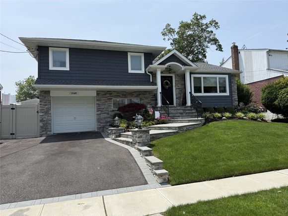1548 Peapond Road North Bellmore, NY House Active - Photo 1 of 25. Opens carousel modal