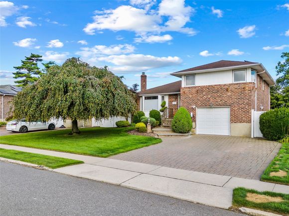 46 Norman Lane Levittown, NY House Active - Photo 1 of 32. Opens carousel modal