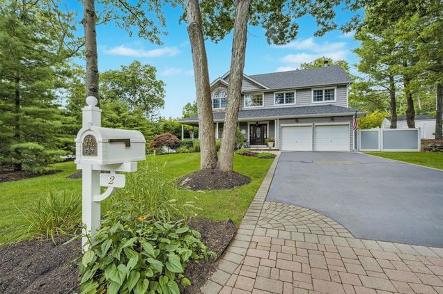 2 Whispering Woods Drive Smithtown, NY House Active - Photo 1 of 34. Opens carousel modal
