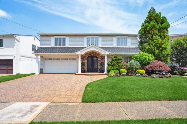 3411 Hewlett Avenue Merrick, NY House Active - Photo 1 of 33. Opens carousel modal