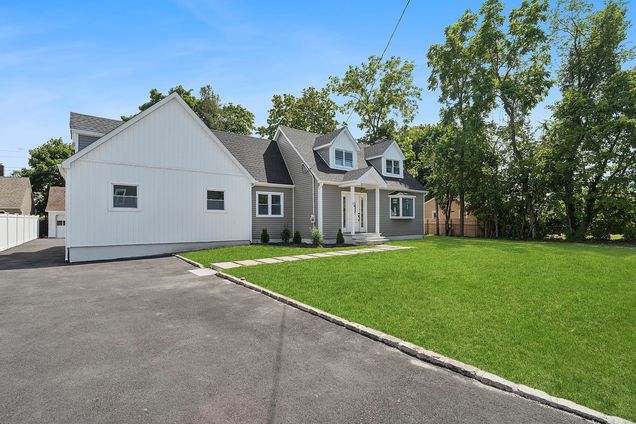 34 Smith Street Greenlawn, NY House Active - Photo 1 of 15. Opens carousel modal