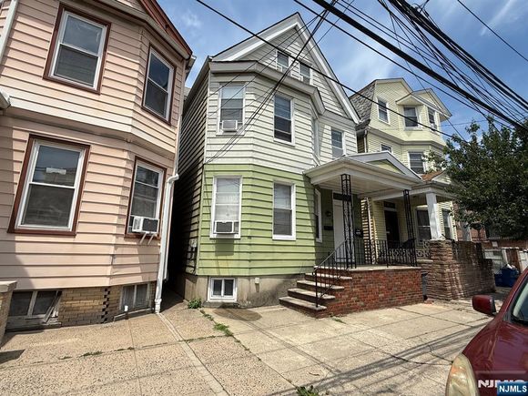 16 Ann Street Harrison, NJ Multifamily Active - Photo 1 of 21. Opens carousel modal