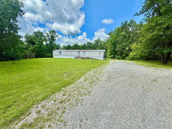 10470 Railroad Rd Mineral Point, MO House Active - Photo 1 of 37. Opens carousel modal