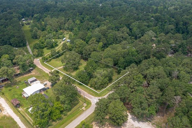 17396 Woods Drive New Caney, TX Plot of land Active - Photo 1 of 6. Opens carousel modal