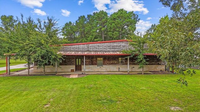 9250 County Road 302 Plantersville, TX House Active - Photo 1 of 49. Opens carousel modal