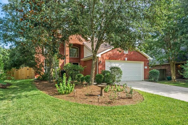 10 Orchid Grove Place The Woodlands, TX House Active - Photo 1 of 26. Opens carousel modal