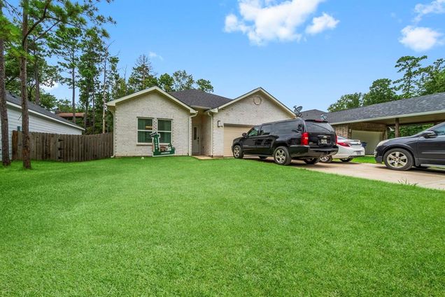192 S Village Cove Loop Livingston, TX House Active - Photo 1 of 34. Opens carousel modal