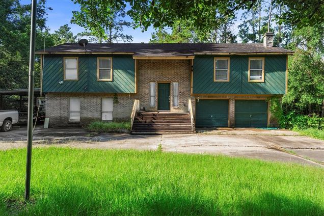 1742 Sunrise Trail Kingwood, TX House Active - Photo 1 of 42. Opens carousel modal