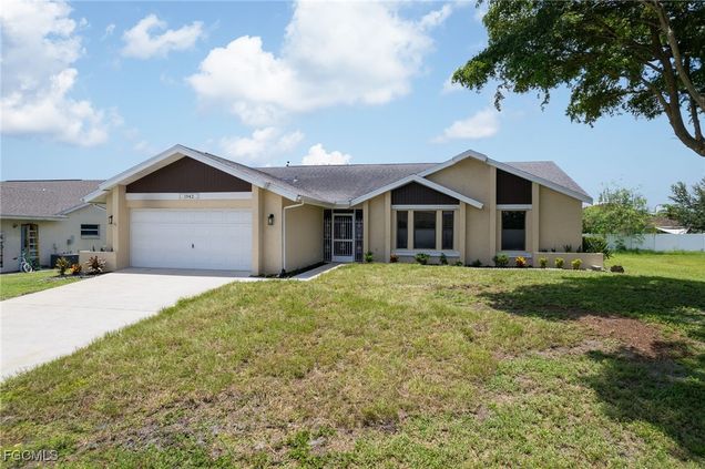1942 SE 8th Place Cape Coral, FL House Active - Photo 1 of 30. Opens carousel modal