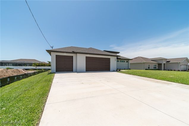 1644 NW 37th Avenue Cape Coral, FL House Active - Photo 1 of 35. Opens carousel modal