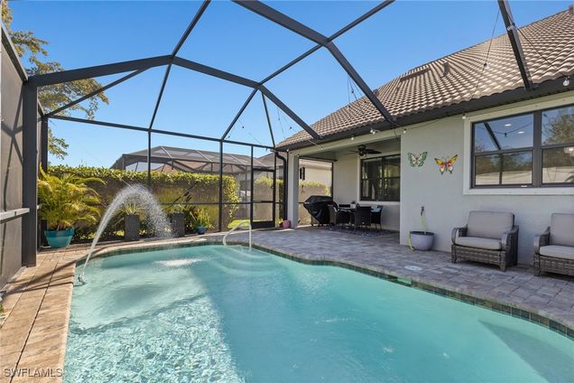 20146 Corkscrew Shores Boulevard Estero, FL House Active - Photo 1 of 50. Opens carousel modal