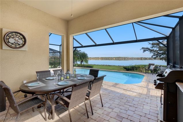20477 Corkscrew Shores Boulevard Estero, FL House Active - Photo 1 of 35. Opens carousel modal