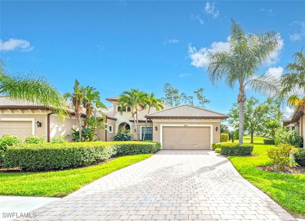 7563 Moorgate Point Way Naples, FL House Active - Photo 1 of 50. Opens carousel modal