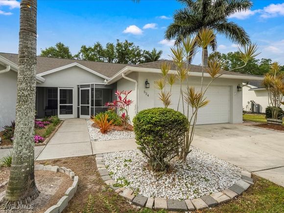 524 Saint Andrews Boulevard Naples, FL House Active - Photo 1 of 27. Opens carousel modal