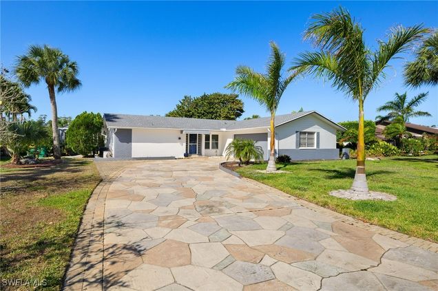 248 Bay Meadows Drive Naples, FL House Active - Photo 1 of 26. Opens carousel modal