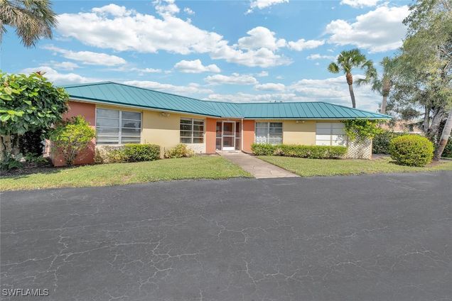 210 Pebble Beach Naples, FL Condo Active - Photo 1 of 10. Opens carousel modal