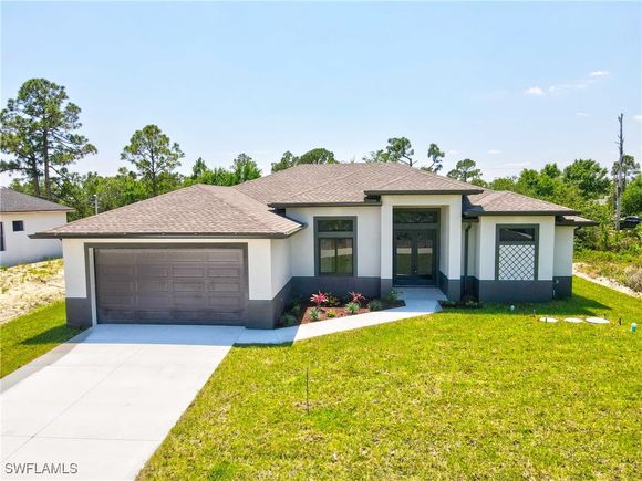 1252 Nimitz Boulevard Lehigh Acres, FL House Sold - Photo 1 of 50. Opens carousel modal
